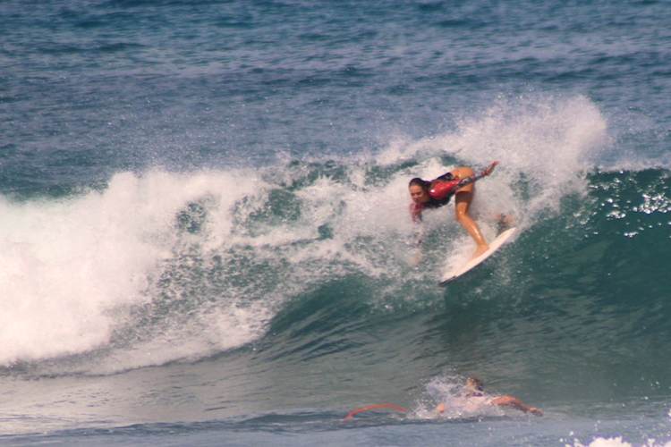 camille spitz surfing waves